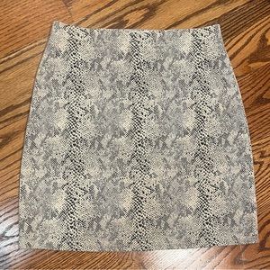 Used See and be seen skirt | Boutique snake skin mini skirt | cream & black |